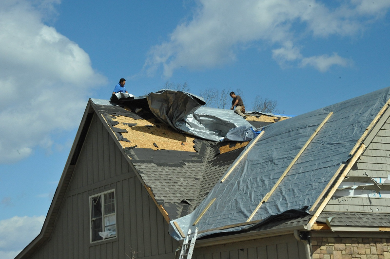 How to Tarp a Leaking Roof A StepbyStep Guide KTM Roofing Boston